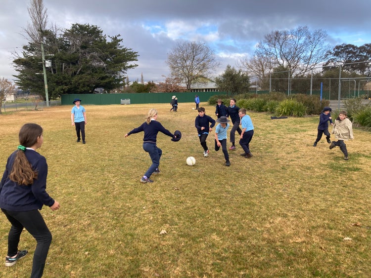 Kids playing football